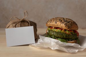 front-view-burger-with-delivery-package_23-2148678842